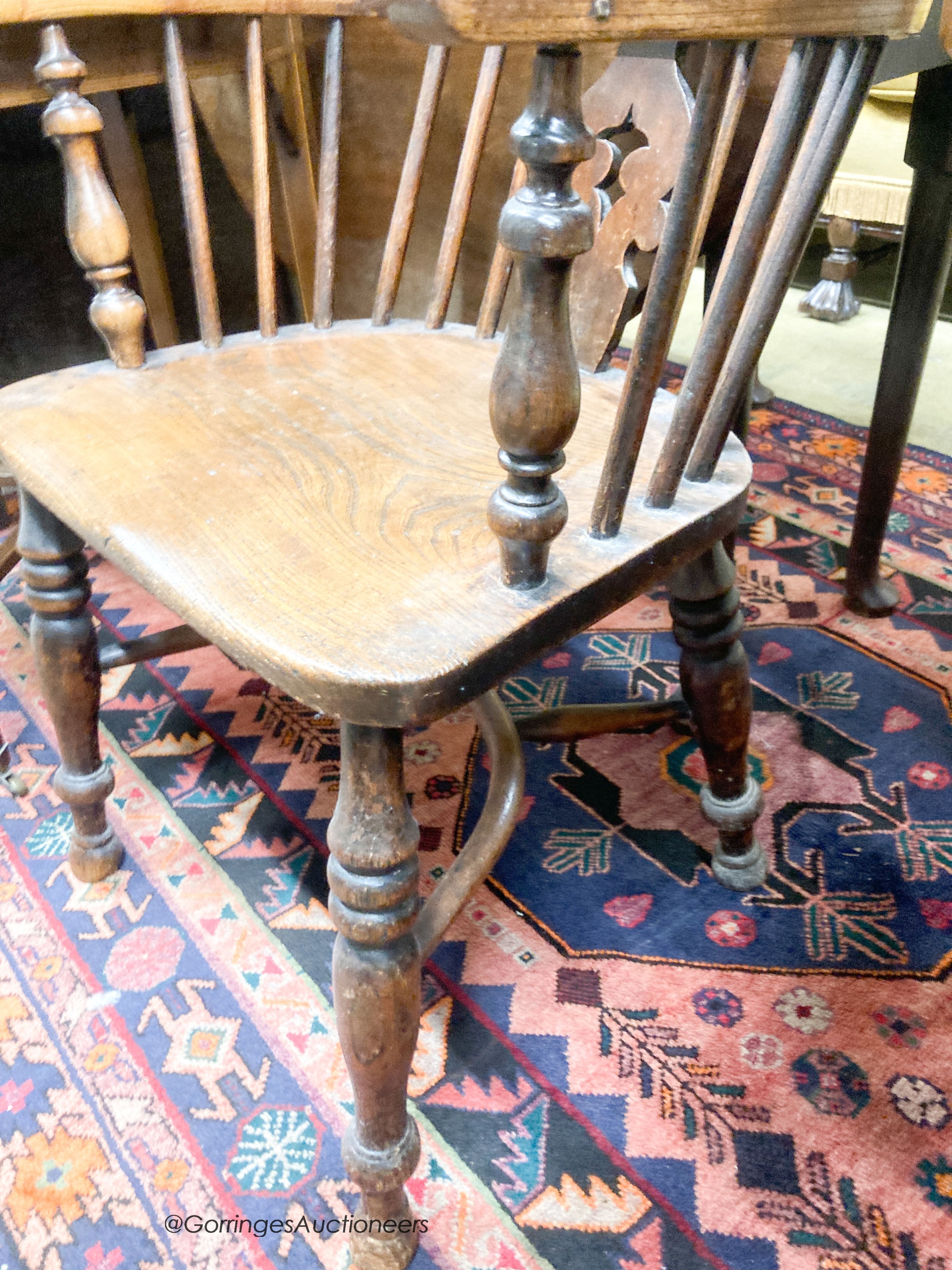 A Victorian elm and ash Windsor armchair, width 54cm, depth 44cm, height 108cm